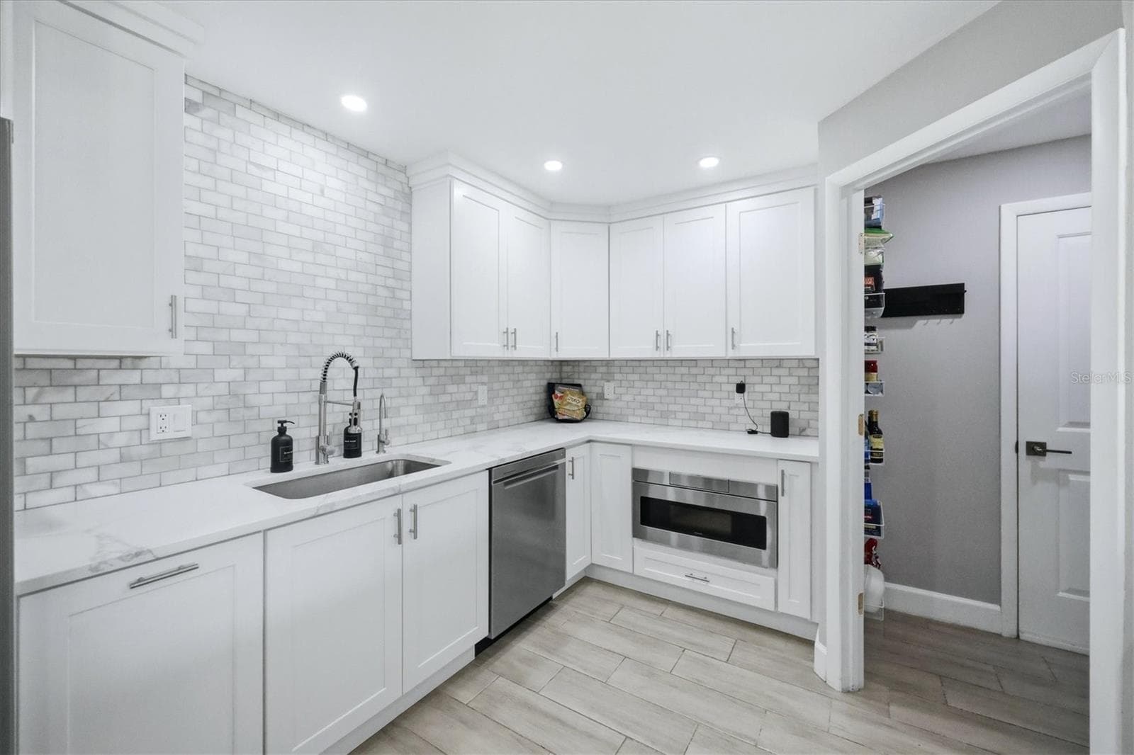 Kitchen/Pantry with entry to Garage - 5605 SAWGRASS RD, SARASOTA