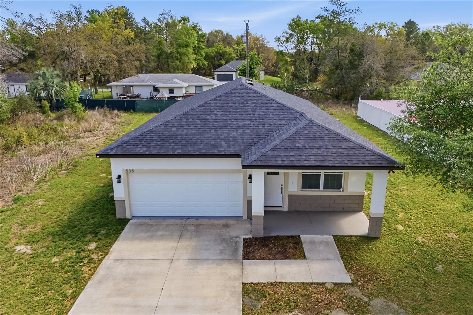 Single Family Residence at 535 MARION OAKS LN, OCALA, photo 2 of 38