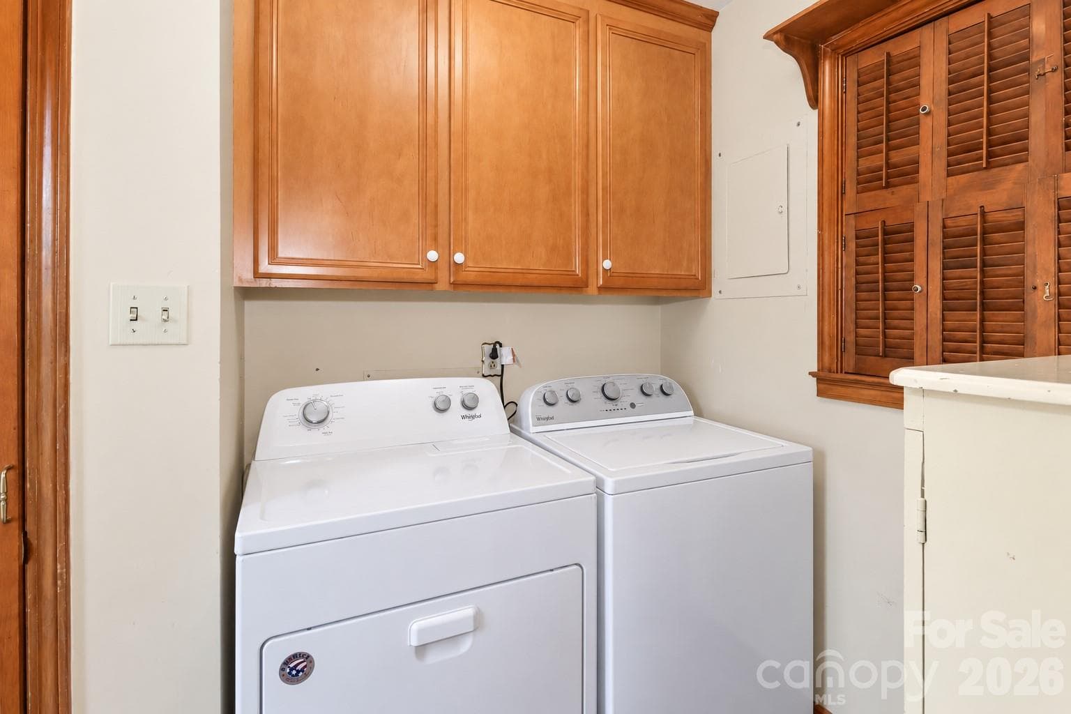 laundry with door to patio - 1609 Museum Road, Statesville