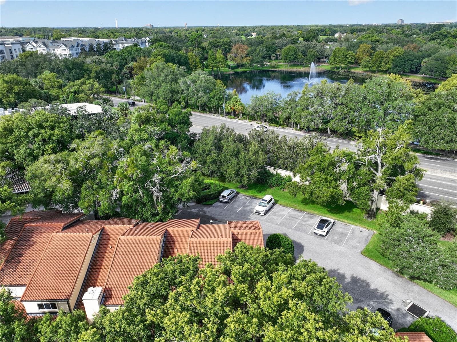 AERIAL VIEW OF TOWNHOME WITH LAKE LILY ACROSS U.S. 17-92 - 223 QUAYSIDE CIR #C11, MAITLAND