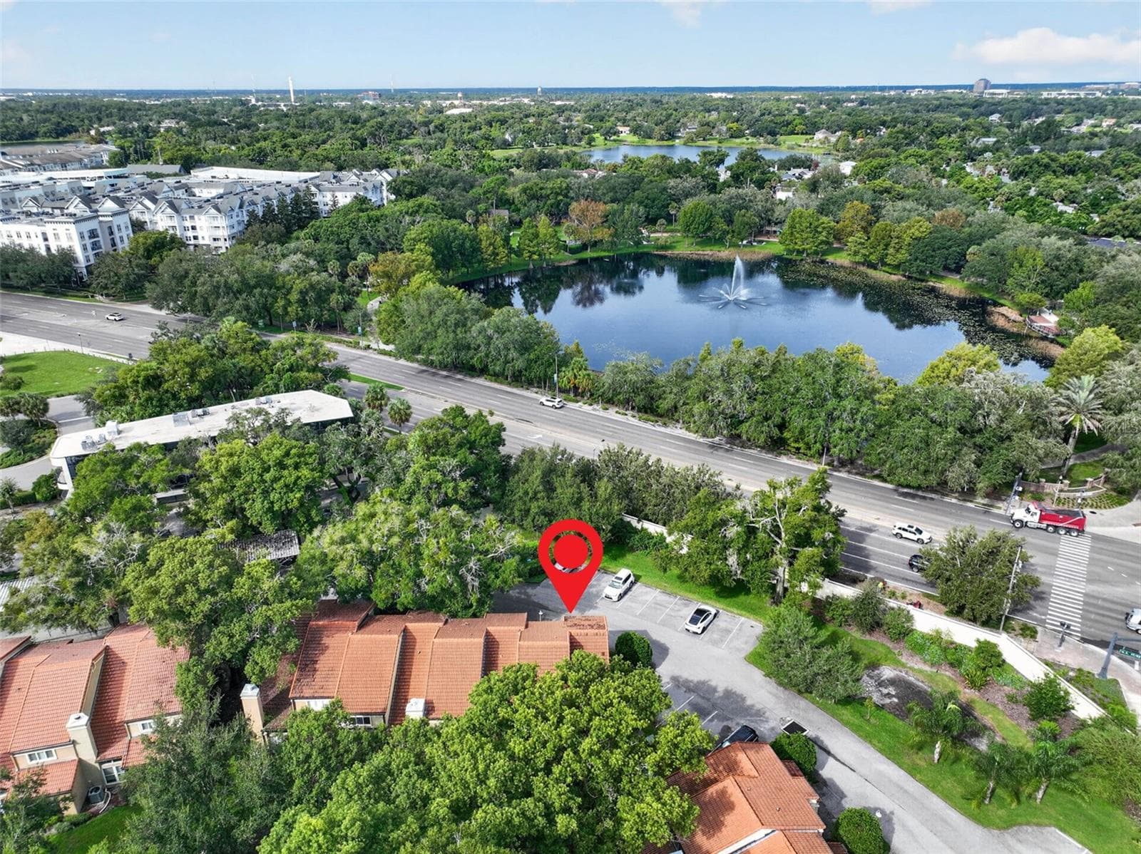 AERIAL VIEW OF TOWNHOME WITH LAKE LILY ACROSS U.S. 17-92 - 223 QUAYSIDE CIR #C11, MAITLAND