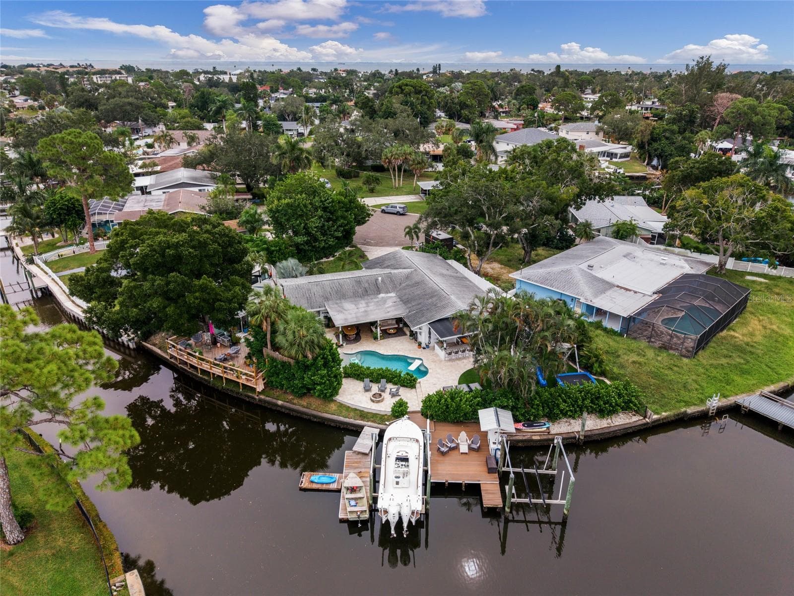 Aerial View of Property and Water Frontage - 4785 BUTTERFLY PL NE, ST PETERSBURG