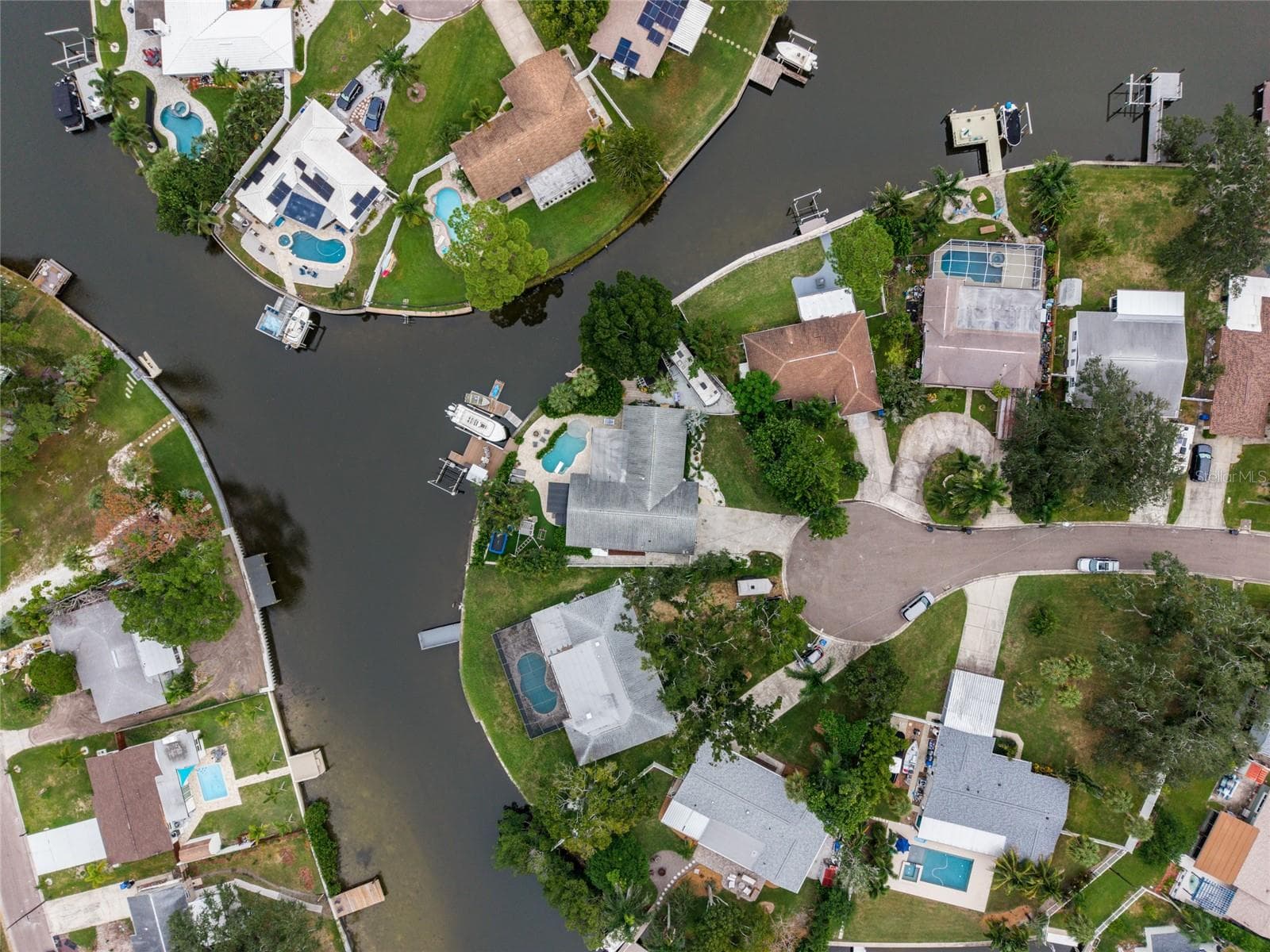 Aerial View of Property and Water Frontage - 4785 BUTTERFLY PL NE, ST PETERSBURG