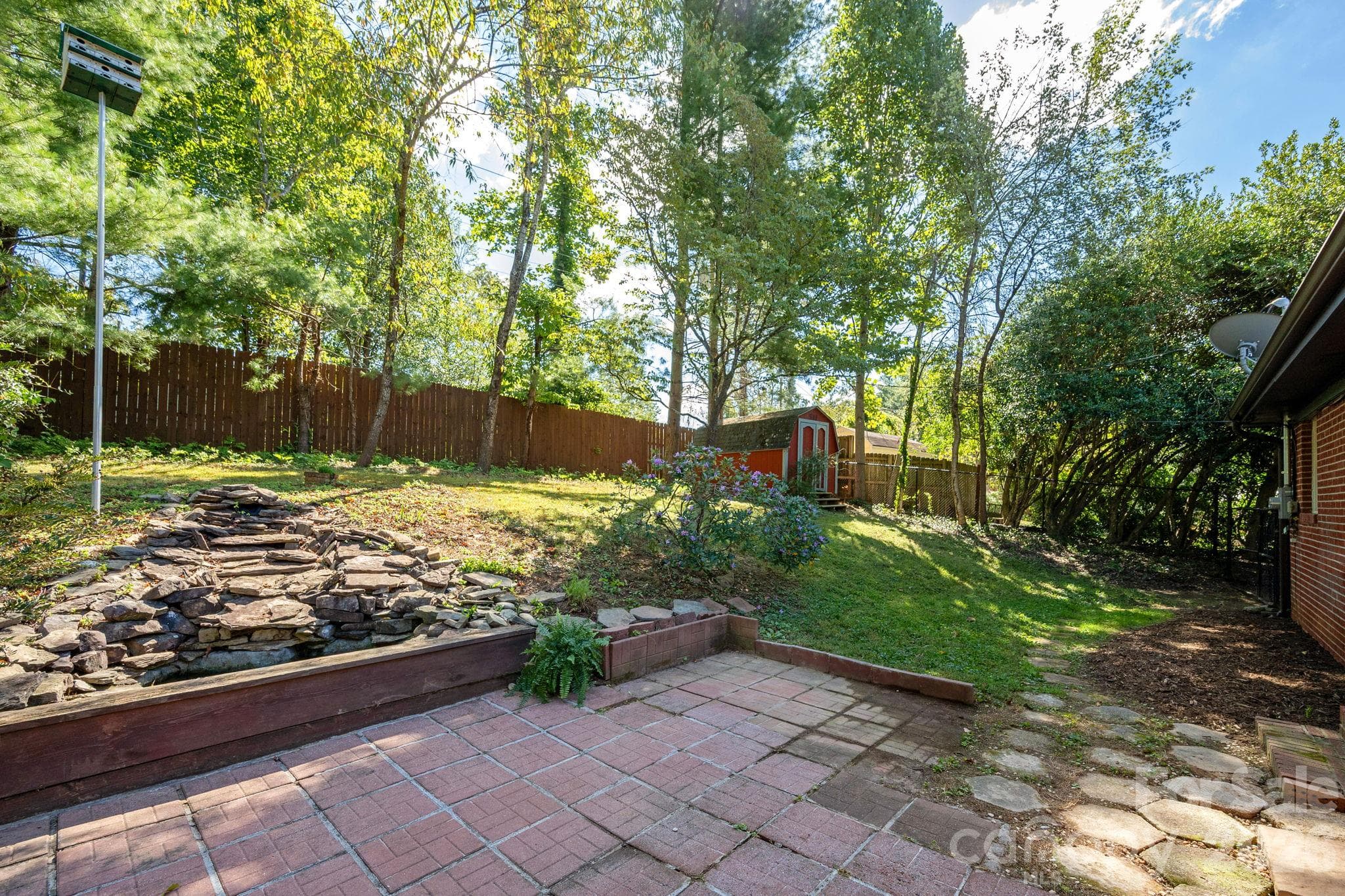 Water feature and large fenced in yard - 224 Lyndale Road, Hendersonville
