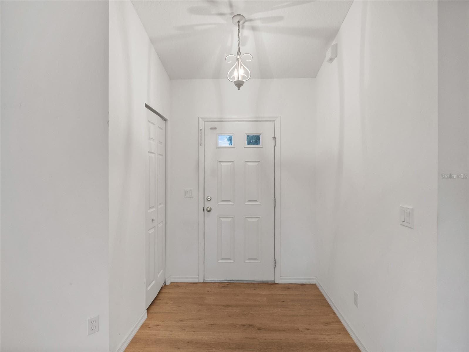 Hallway to front Door - 5045 NW 32ND PL, OCALA