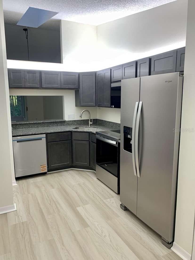 Condominium at 13136 CYPRESS HILL DR #125A, HUDSON, photo 2 of 24