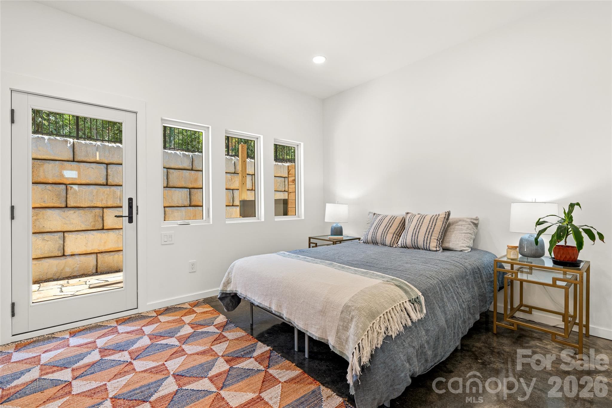 Lower level bedroom opens onto Tennessee flagstone patio. - 6 Roberts Street, Asheville