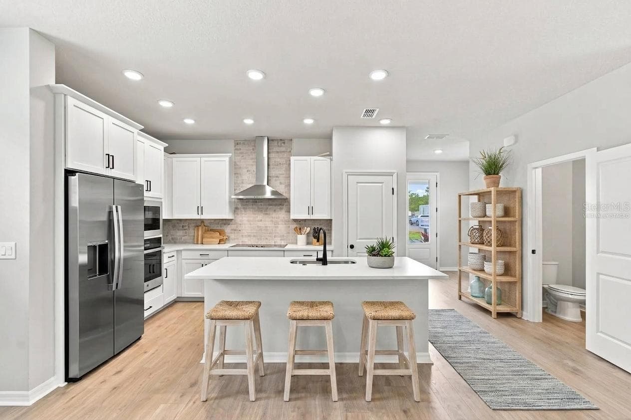 Kitchen **Virtually Staged - 5617 WHITE IBIS PT, ST CLOUD