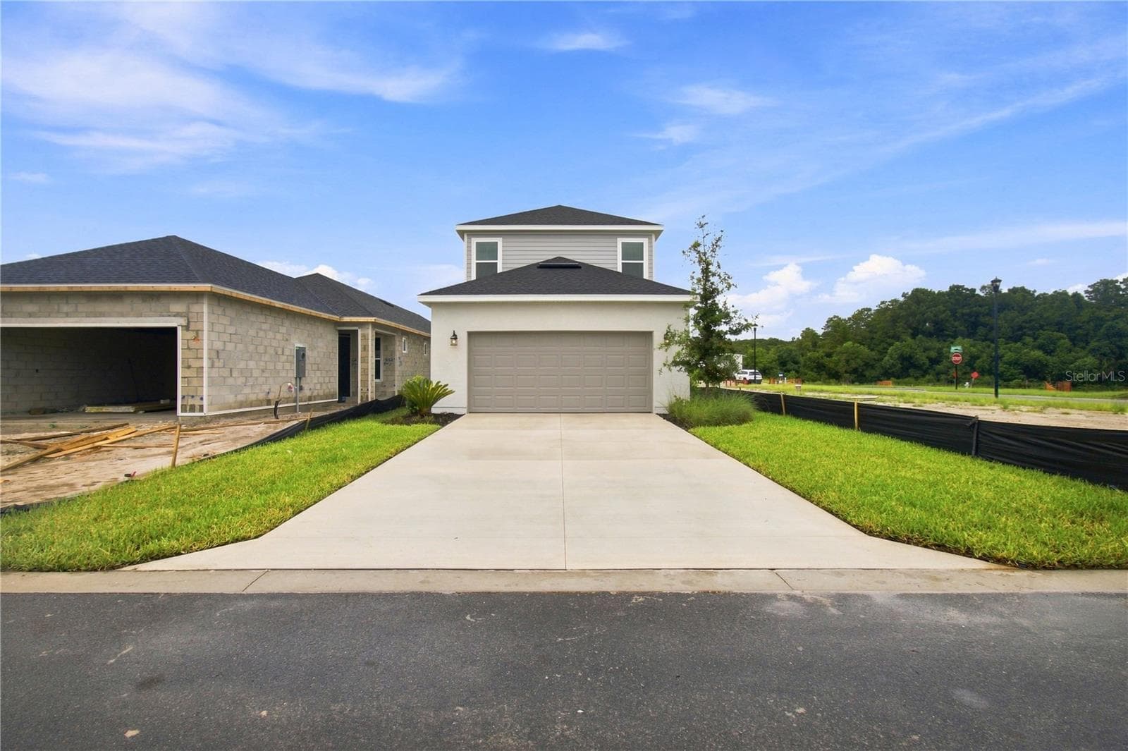Rear Exterior - 5617 WHITE IBIS PT, ST CLOUD