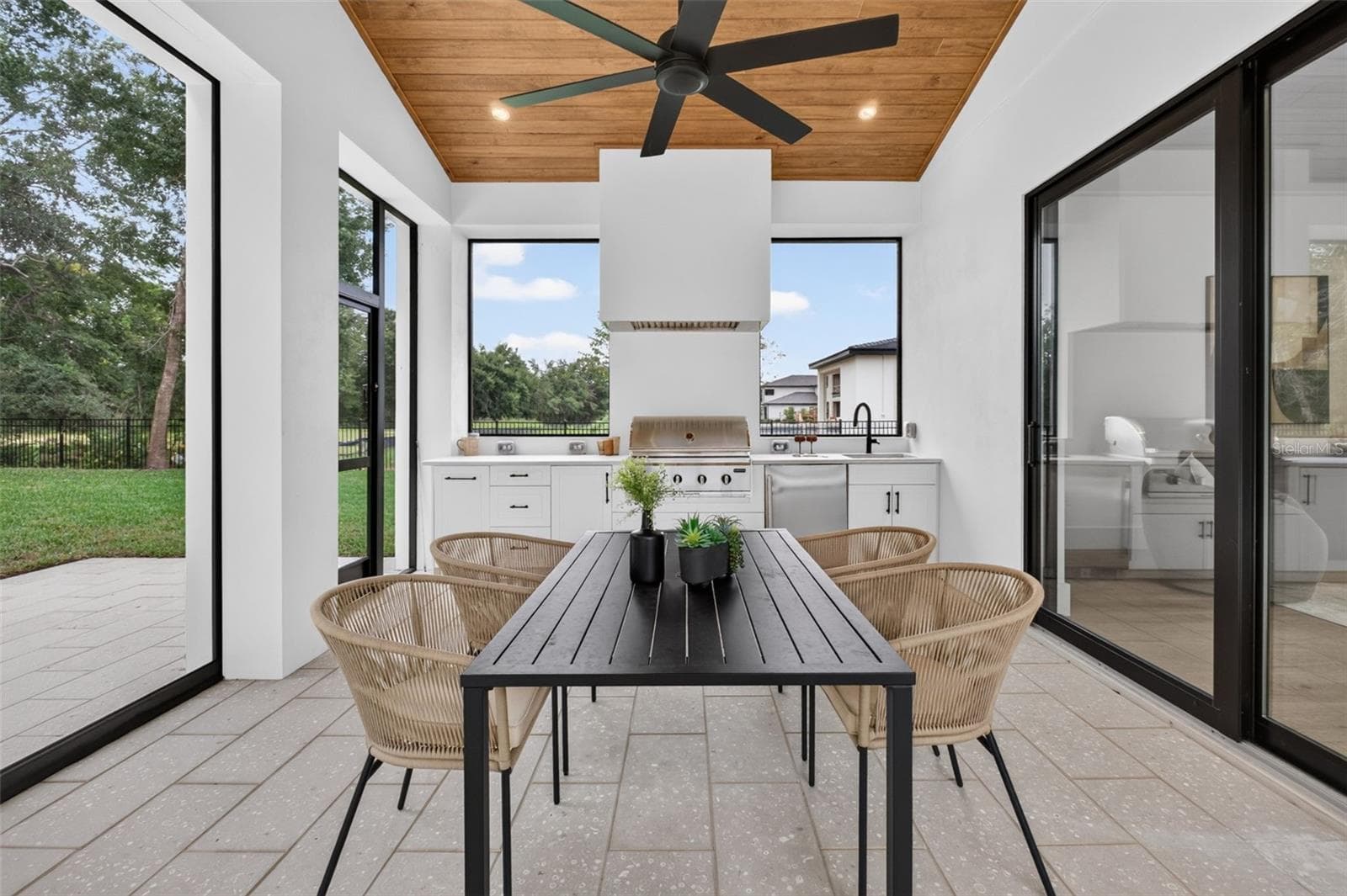 Covered lanai with motorized retractable screens - 1815 WINDERMERE RD, WINDERMERE