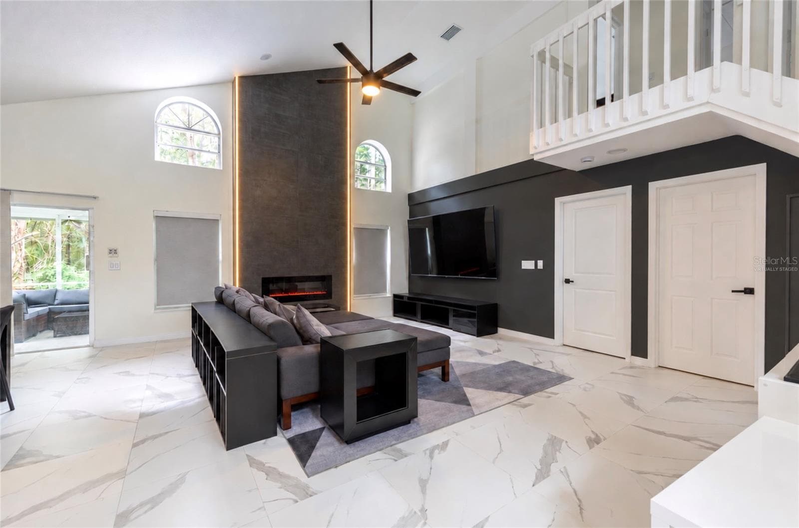 virtually staged living room - 10720 SPRING BROOK LN, ORLANDO