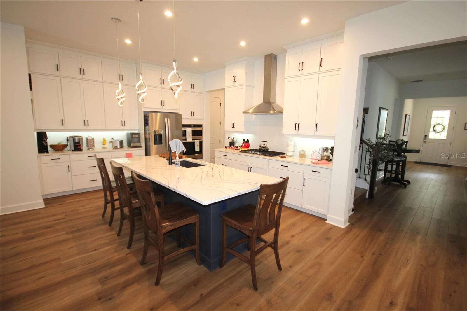 KITCHEN WITH CEILING HEIGHT CABINETRY - 1859 BEACH RIDGE RD, CELEBRATION