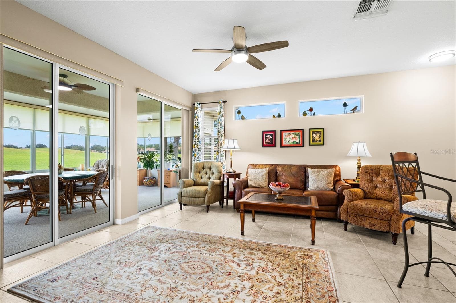 Living Room and Florida Room - 2057 INVERNESS GREENS DR, SUN CITY CENTER