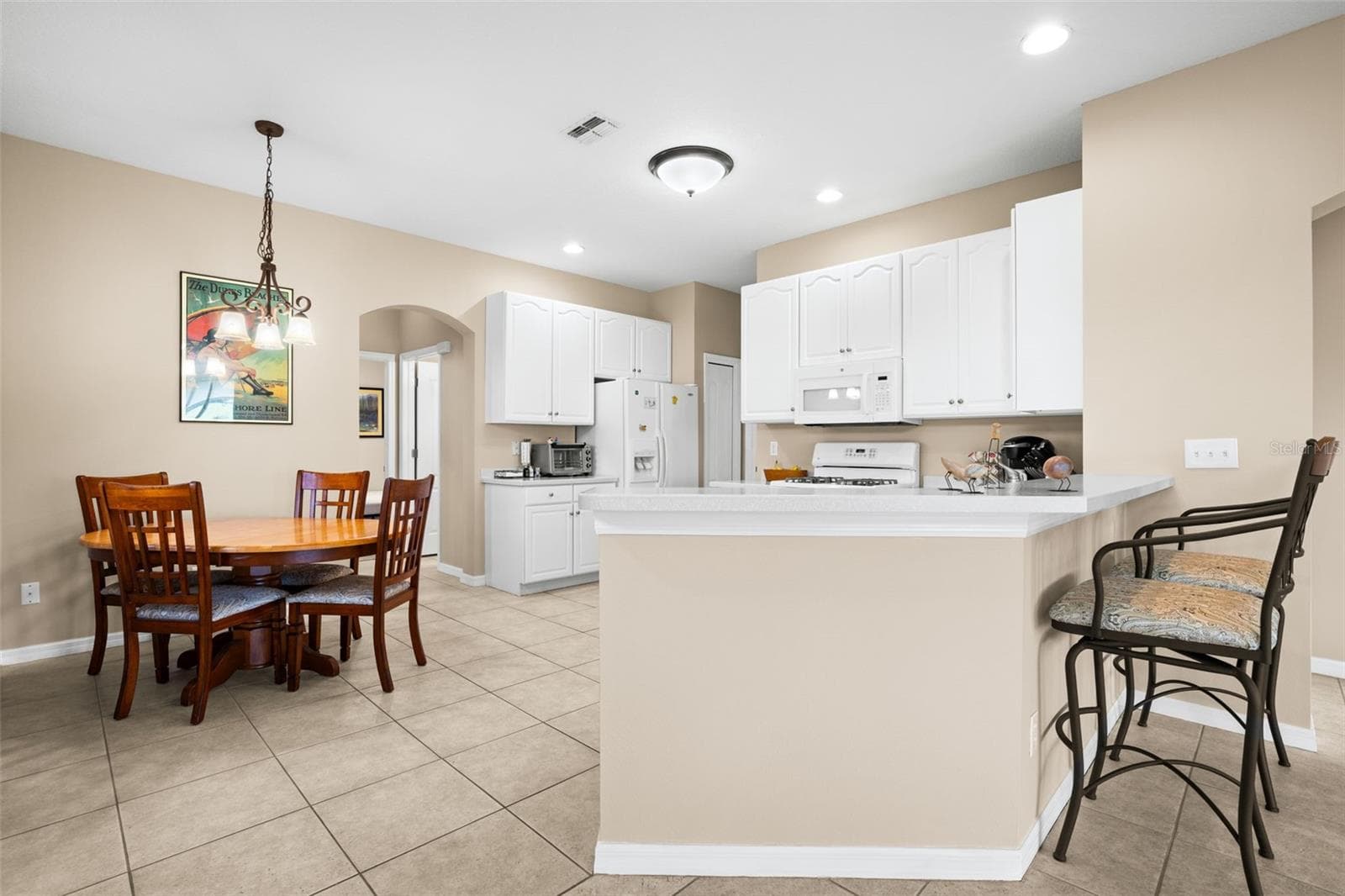 Kitchen and Dining Space - 2057 INVERNESS GREENS DR, SUN CITY CENTER