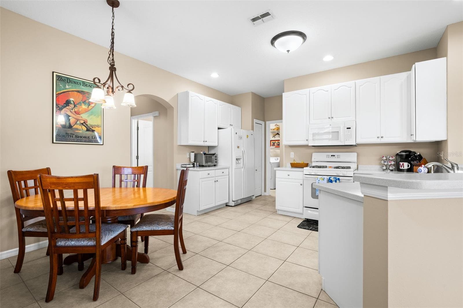 Kitchen and Dining Space - 2057 INVERNESS GREENS DR, SUN CITY CENTER