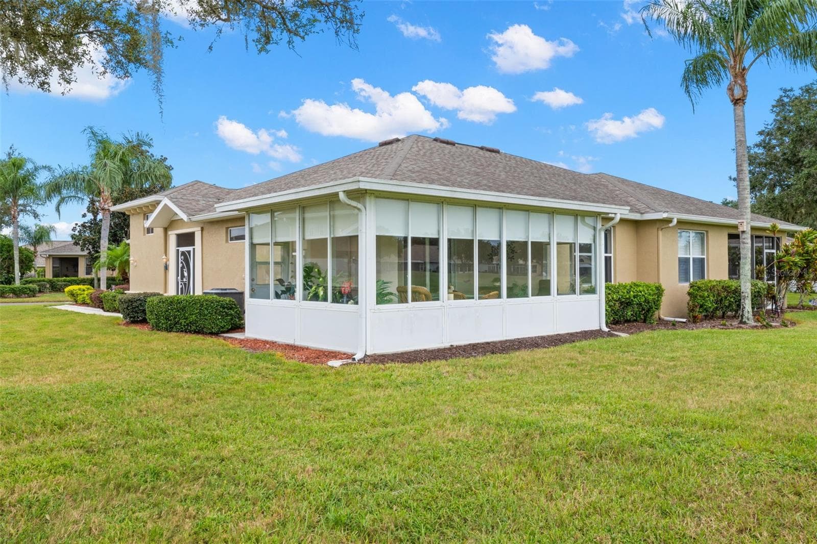 Rear Exterior - 2057 INVERNESS GREENS DR, SUN CITY CENTER