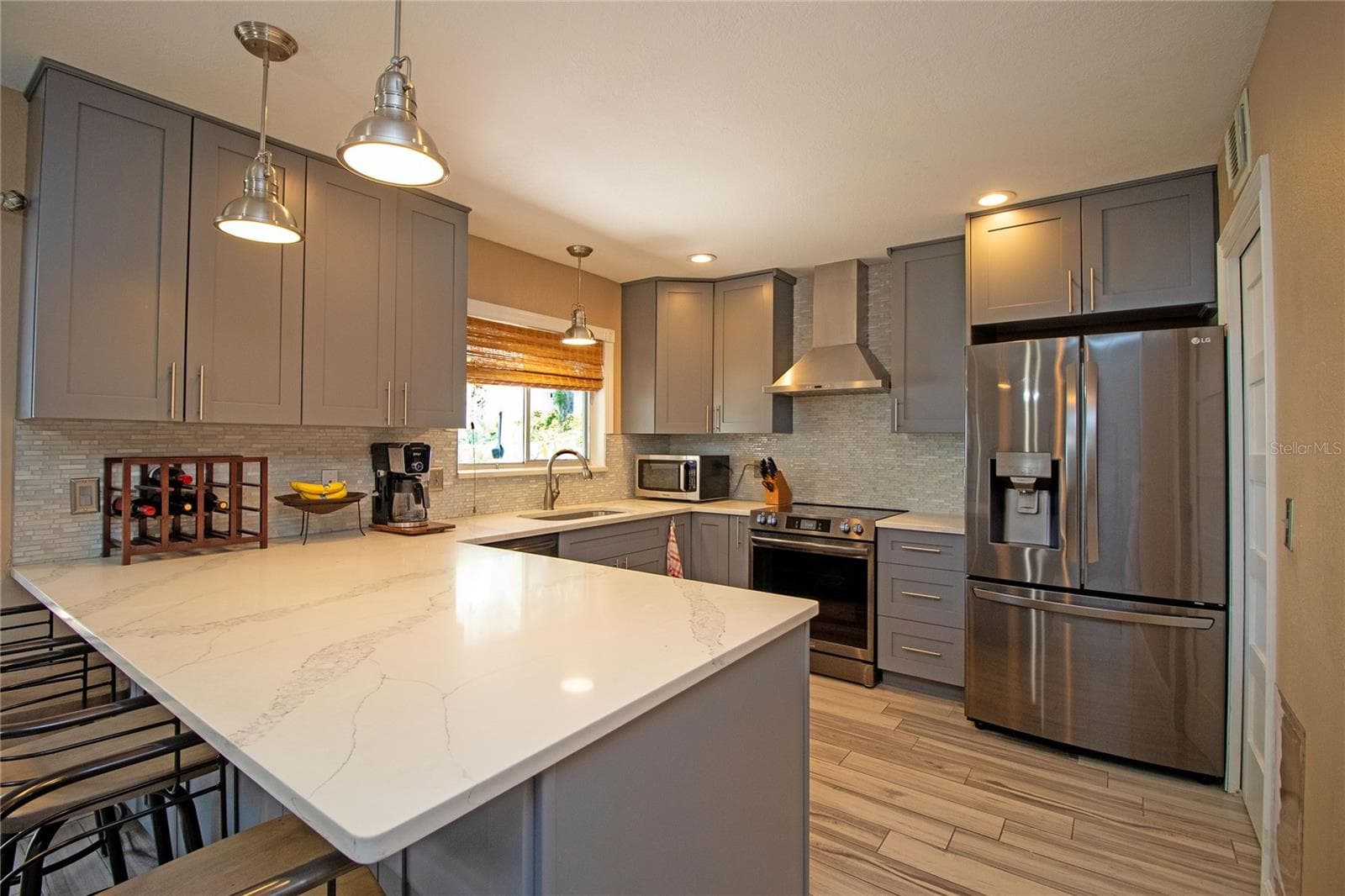 Beautifully updated kitchen has style and function. - 1640 CAPE HOPE AVE NE #2, ST PETERSBURG