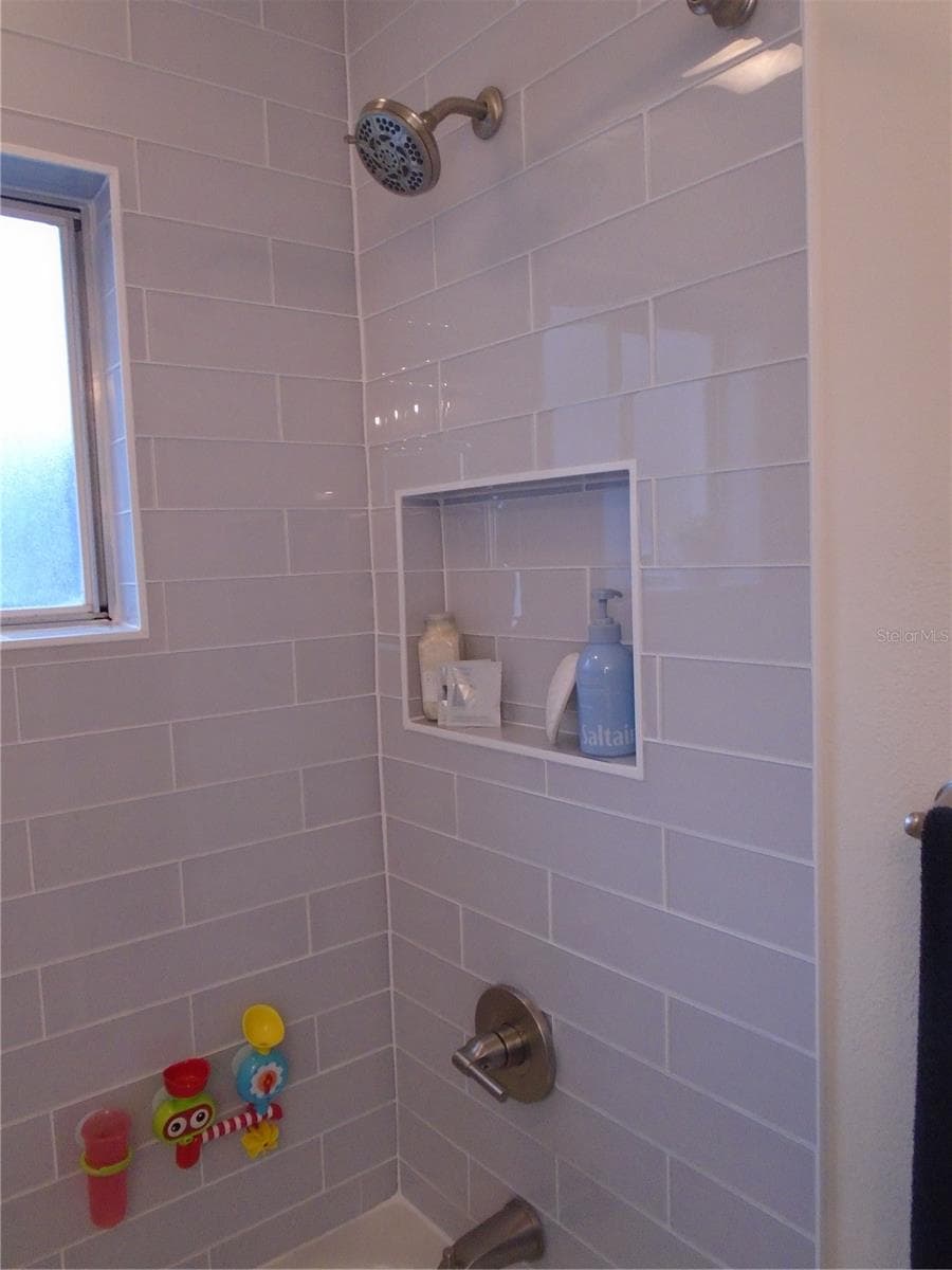 GUEST BATH SURROUND TILE - BELLE ISLE
