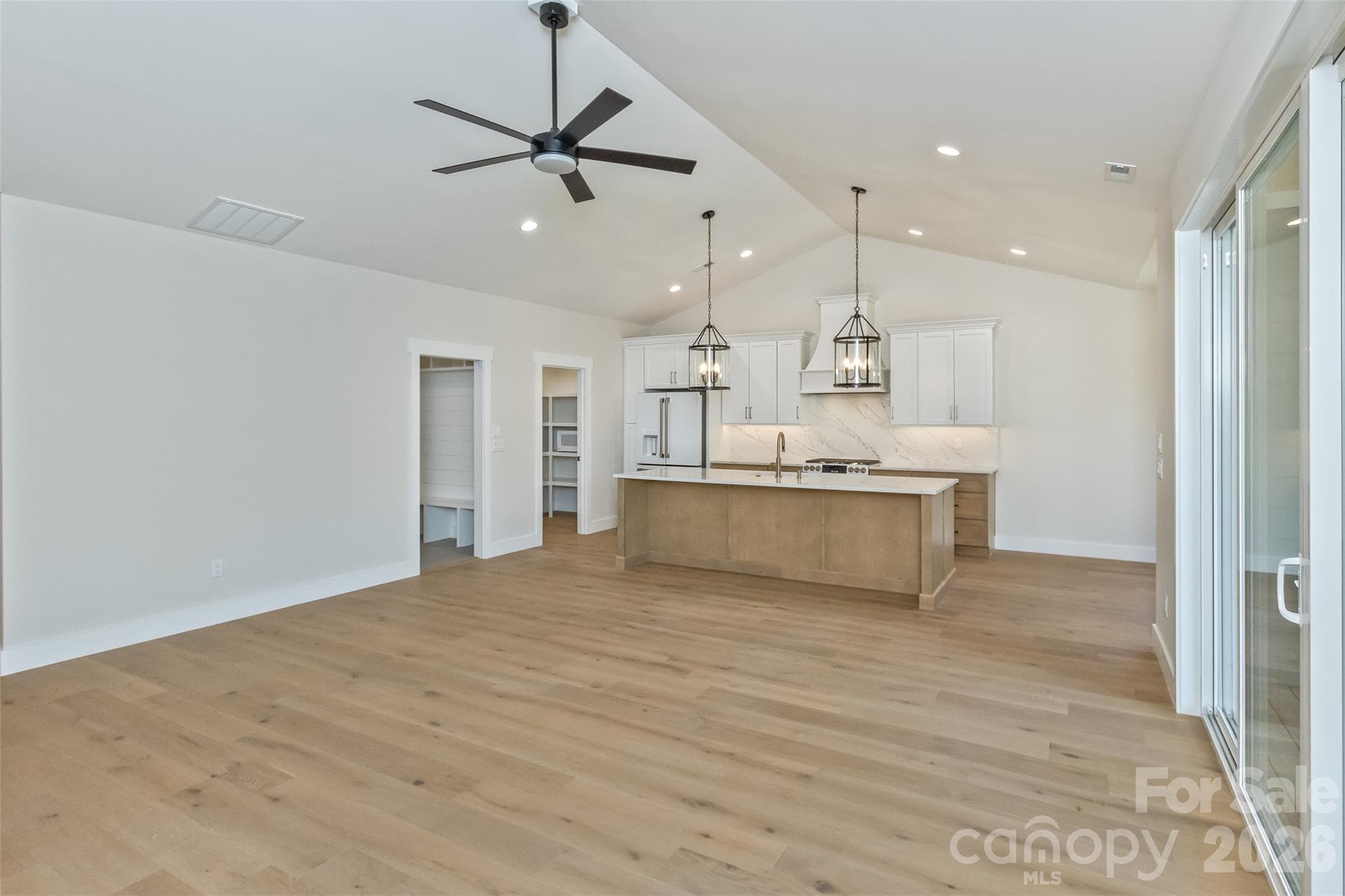 Livingroom towards open Kitchen - 148 Triple Fairways Drive, Hendersonville