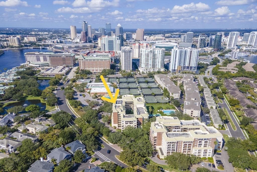 Nestled behind the 24-hour manned gates of prestigious Harbour Island, this beautifully maintained 2-bedroom, 2-bath residence in Harbour Court offers the best of both worlds—vibrant city living and tranquil island retreat. Step outside and stroll to Tampa’s finest restaurants, arts venues, Water Street, Sparkman Wharf, and Amalie Arena, then return home to the peaceful charm of lush landscaping and quiet courtyards. - 1000 S HARBOUR ISLAND BLVD #2306, TAMPA