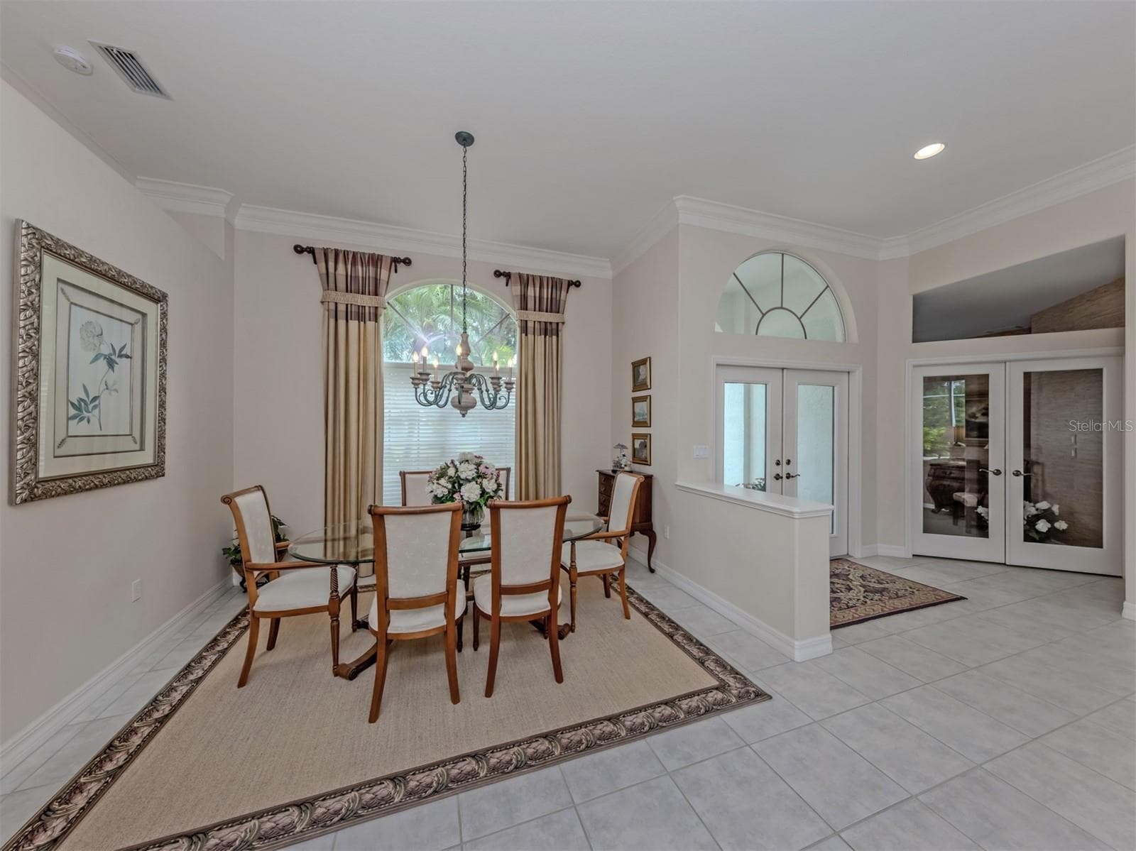 A refined dining space designed for gathering, connection, and effortless entertaining. - 2009 TOCOBAGA LN, NOKOMIS