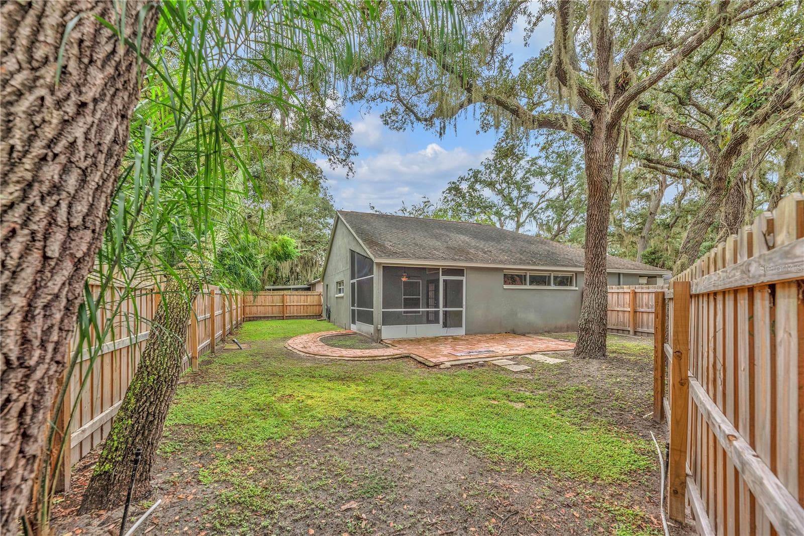 View from the back of the yard. - 4002 LEVONSHIRE PL, VALRICO