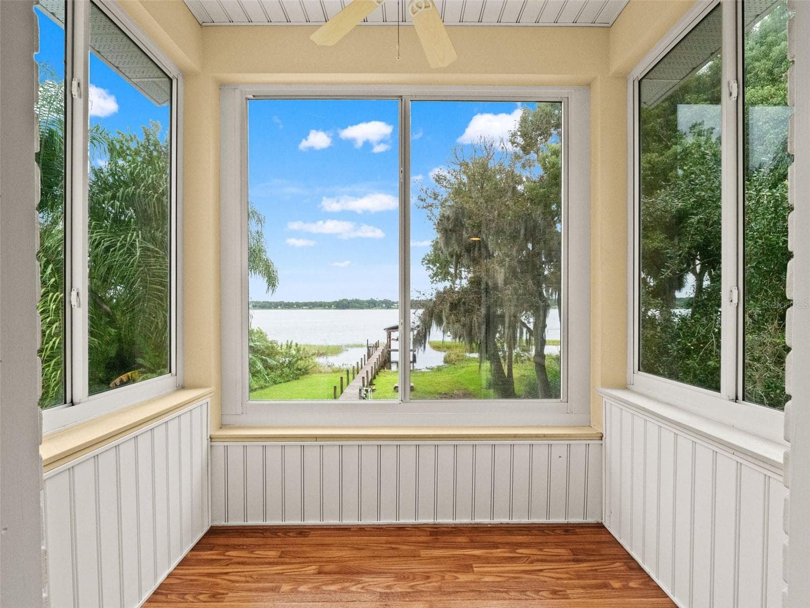 Upstairs enclosed balcony - 7751 SADLER RD, MOUNT DORA