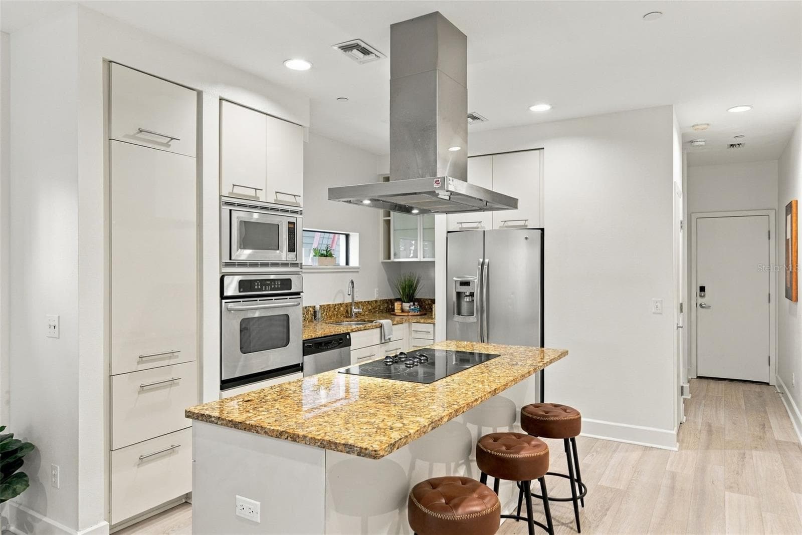 and opens to kitchen - 213 S MOODY AVE #1, TAMPA