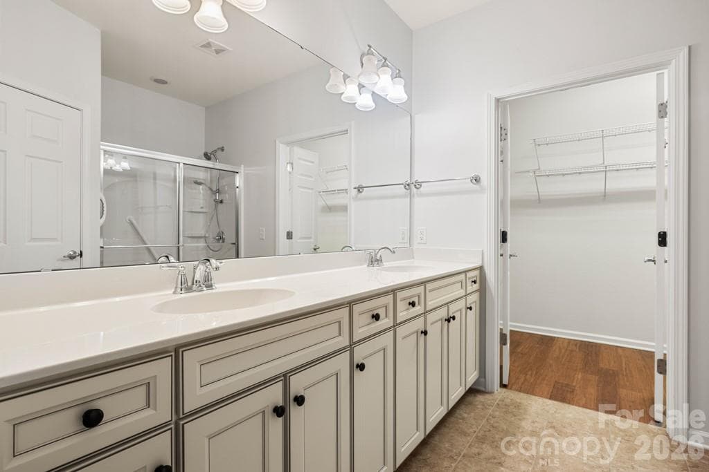Double sinks, shower, and private commode room - 9018 Smokey Hill Lane, Indian Land
