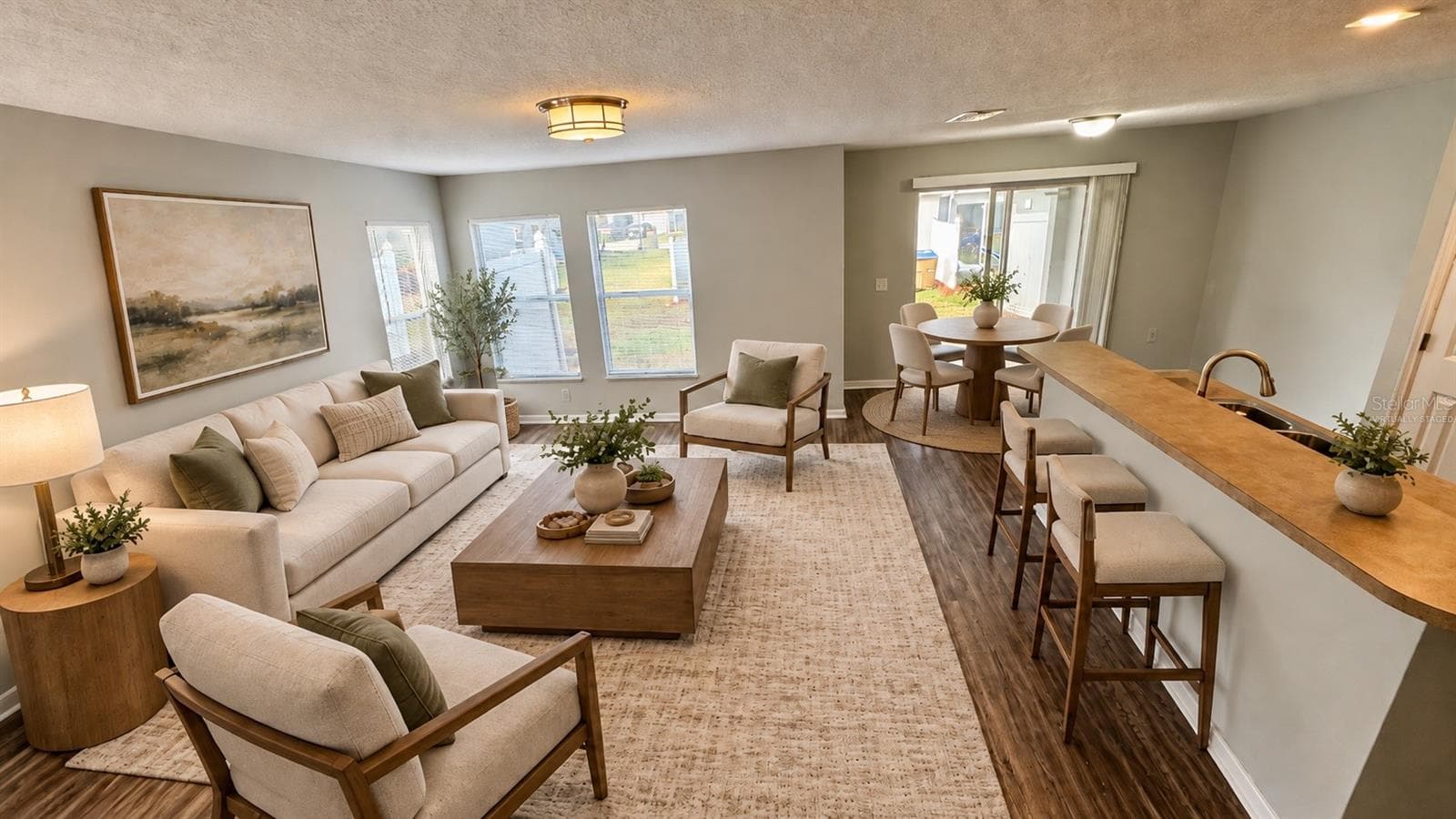 Select photos have been virtually staged to help prospective buyers visualize the potential use of the space and how the home may look when furnished. Virtual staging is for illustrative purposes only. - 2501 HASSONITE ST, KISSIMMEE