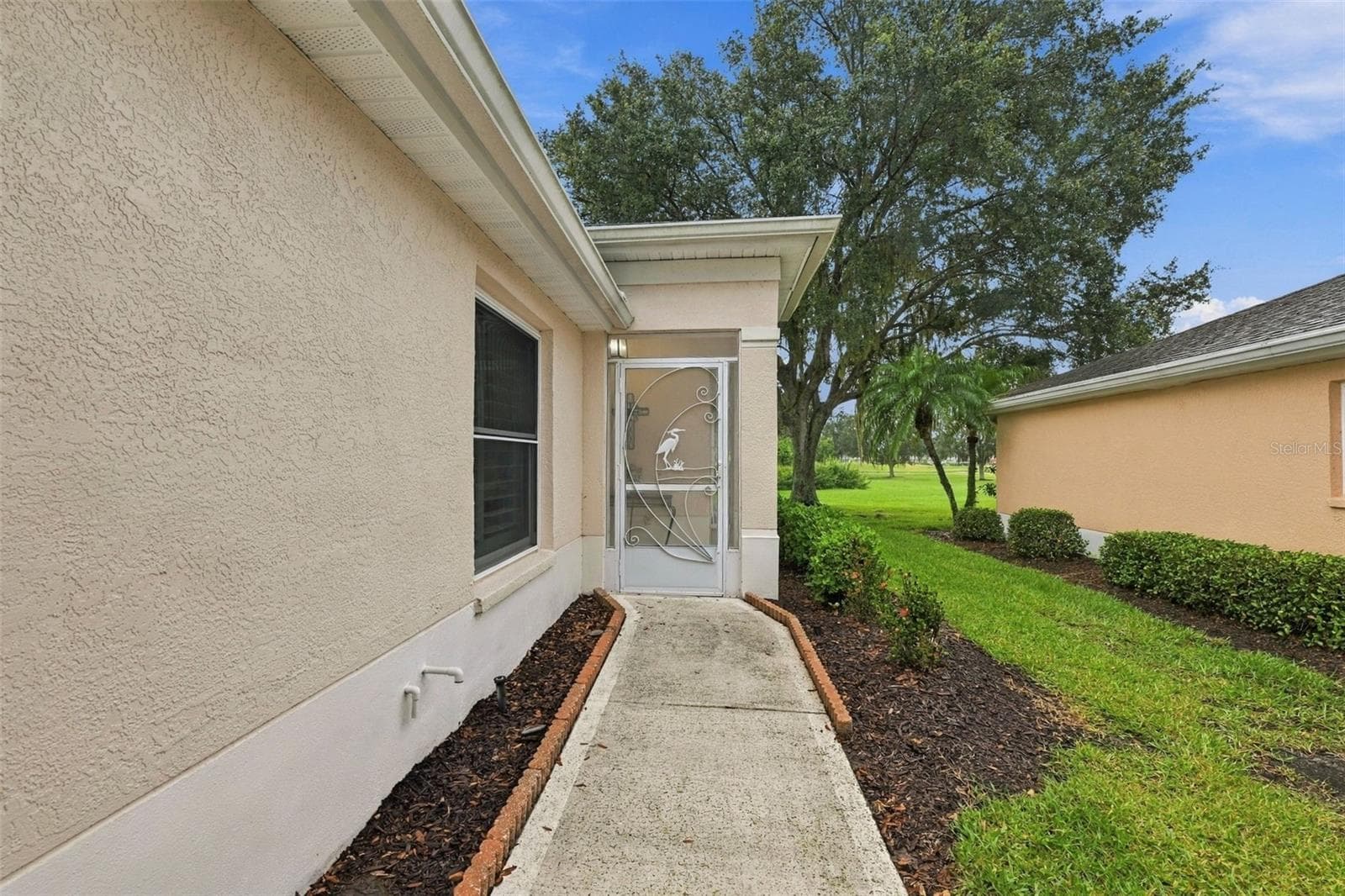 Side entry - 2333 BROOKFIELD GREENS CIR #45, SUN CITY CENTER
