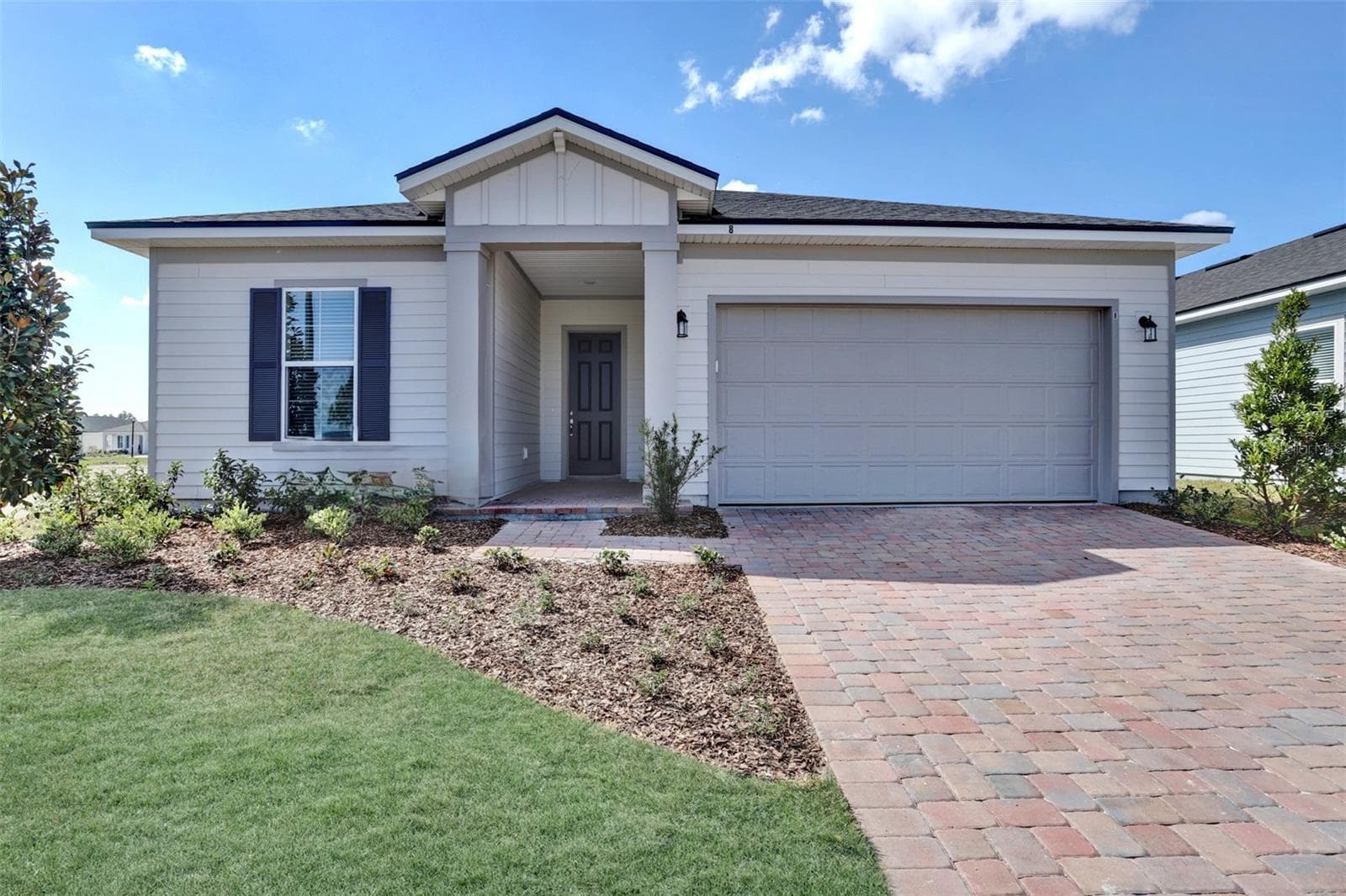 The sample photos included are of the model home and are meant to showcase the craftsmanship and design quality. - REVERIE AT PALM COAST, PALM COAST