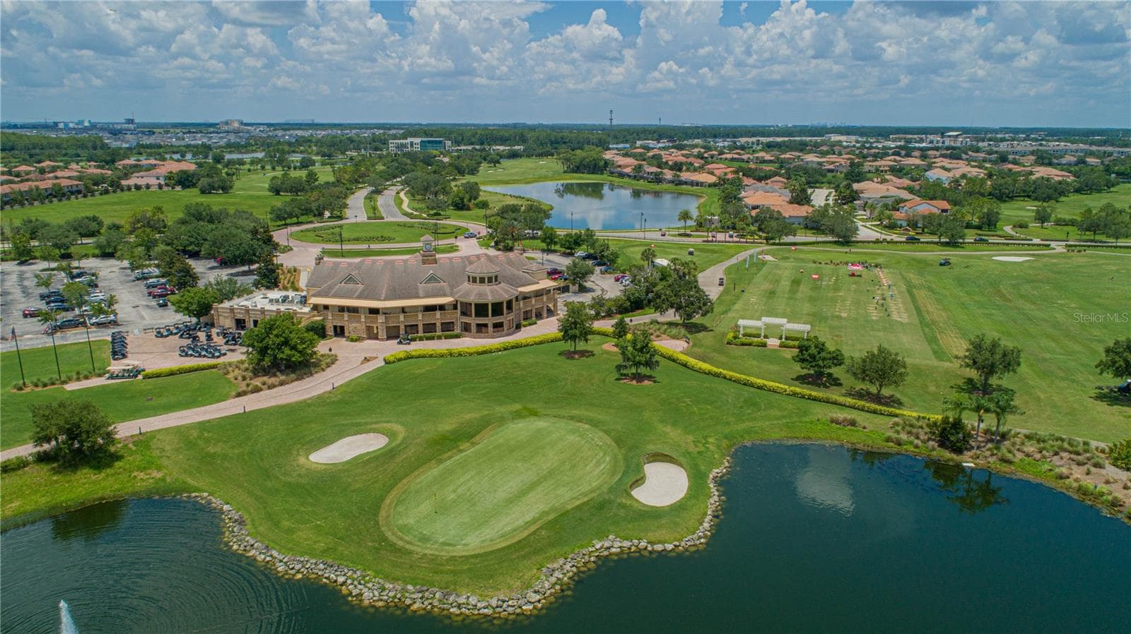 Eagle Creek Golf Clubhouse - 10840 MOBBERLEY CIR, ORLANDO
