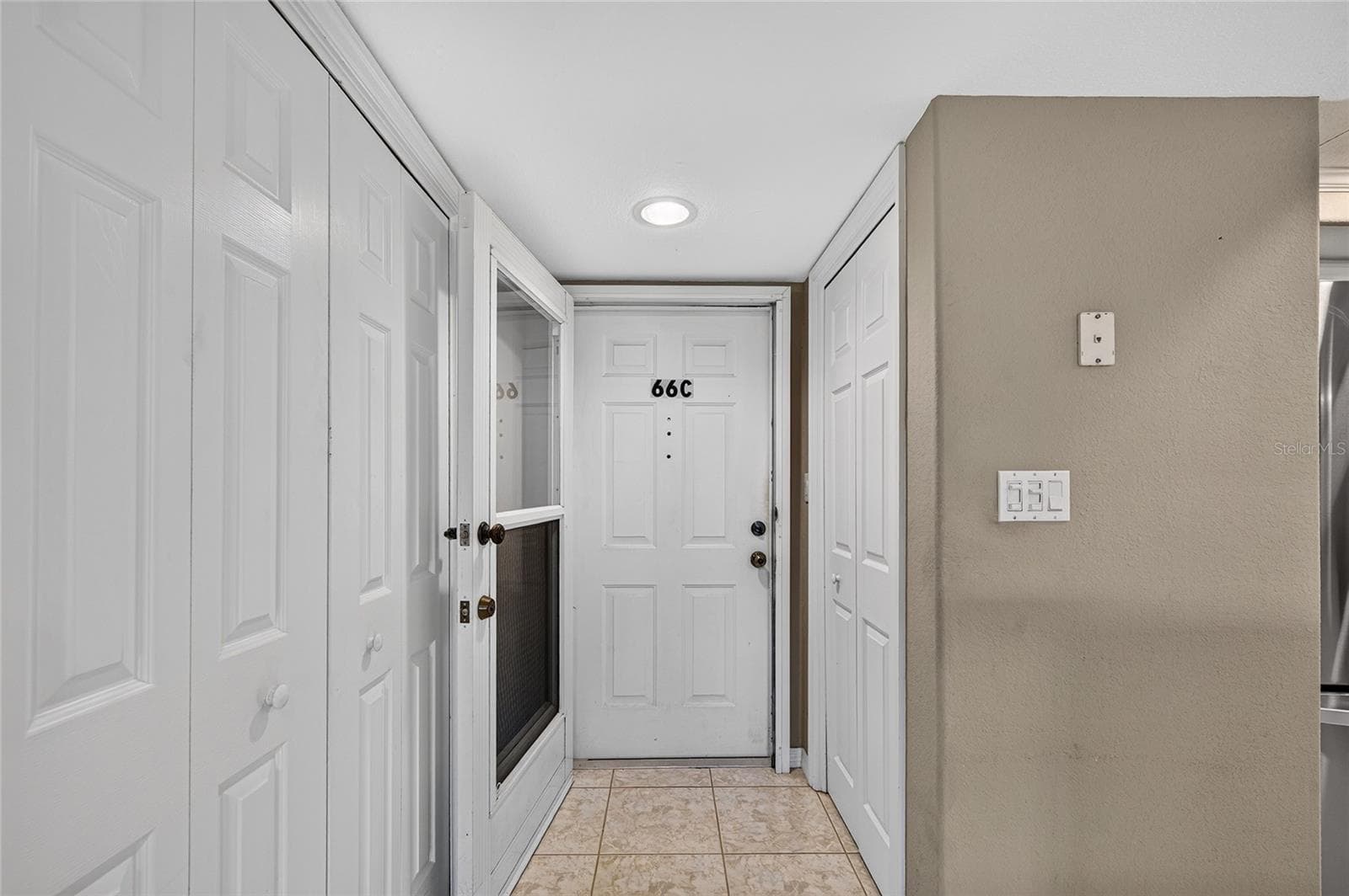 Security door on front entrance - 601 SHREVE ST #66C, PUNTA GORDA