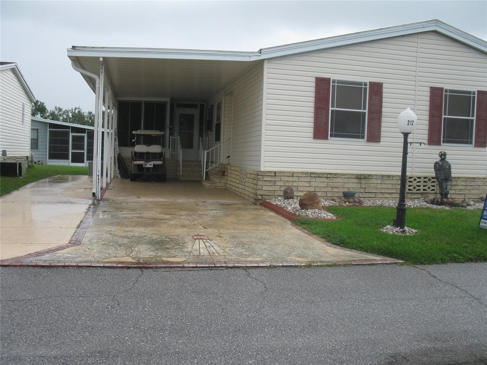 Manufactured Home at 212 YORK COTTAGE DR, HAINES CITY, photo 5 of 31