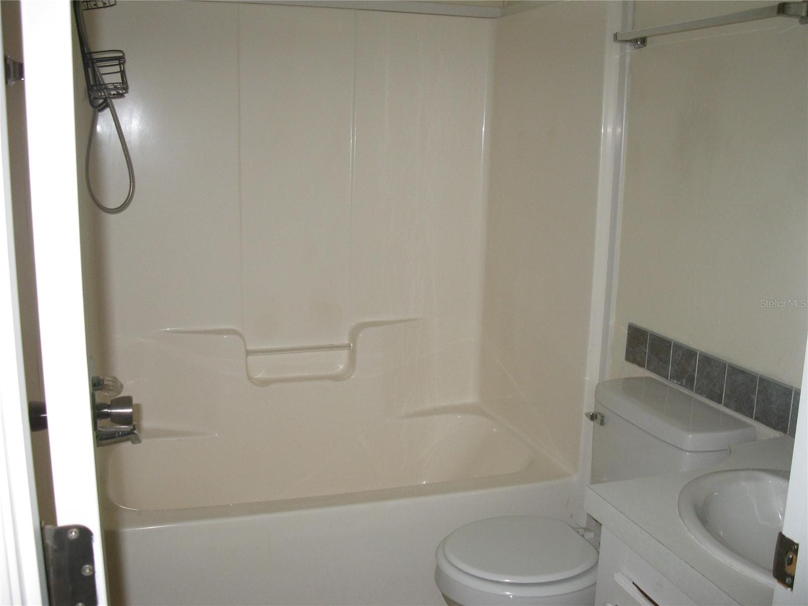 guest bathroom - 212 YORK COTTAGE DR, HAINES CITY