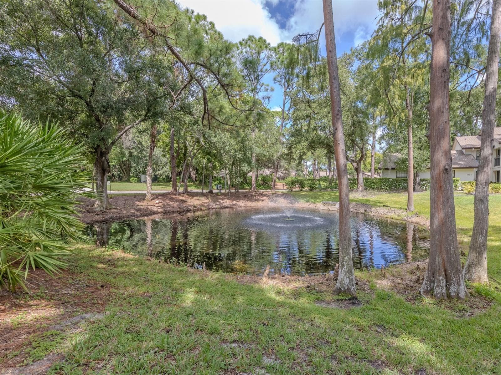 View of pond through the rear - 4713 WINSLOW BEACON #5, SARASOTA