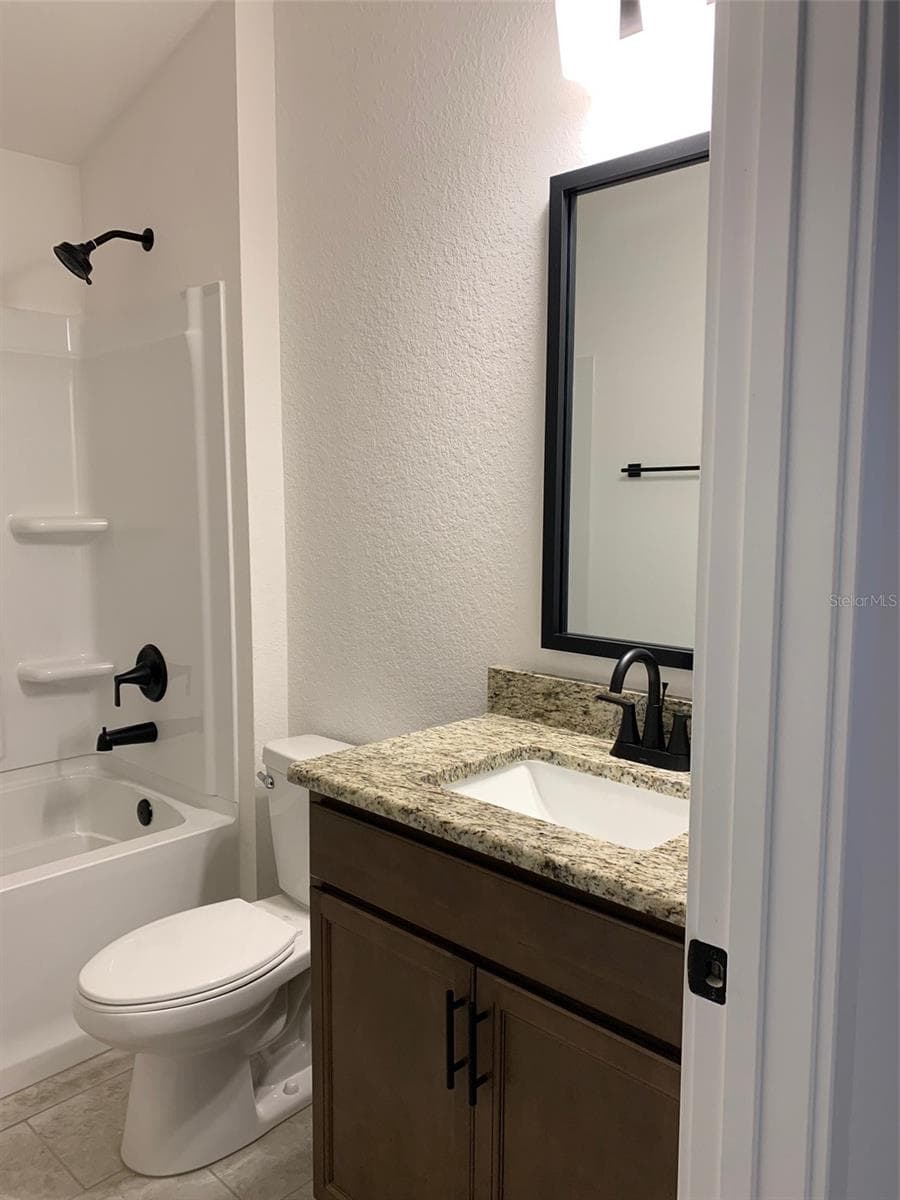 Hall bathroom - 11611 GRACE RD, WEEKI WACHEE