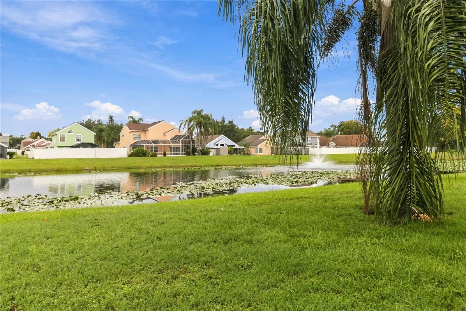 Pond view - 2478 SWEETWATER CLUB CIR #92, KISSIMMEE