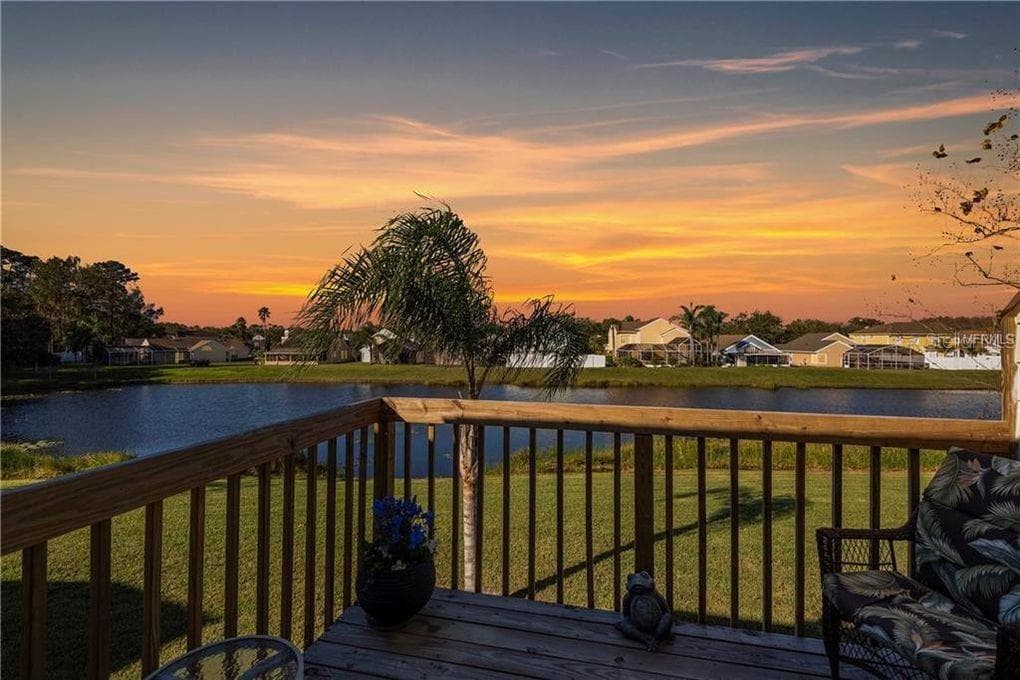 sunsets from primary balcony - 2478 SWEETWATER CLUB CIR #92, KISSIMMEE