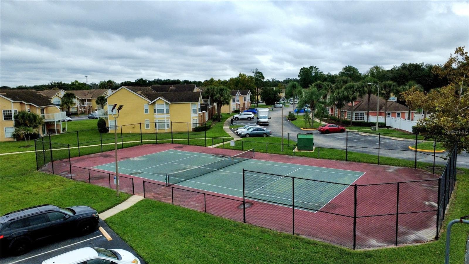 community tennis court - 2478 SWEETWATER CLUB CIR #92, KISSIMMEE