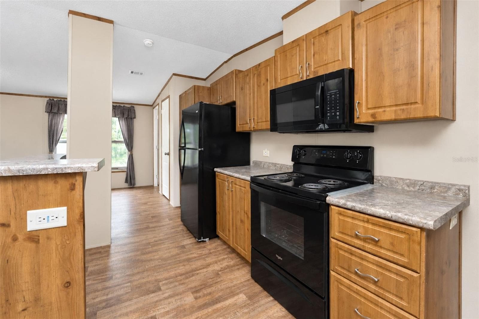 Galley style kitchen - 9066 PINEHAVEN WAY, ENGLEWOOD