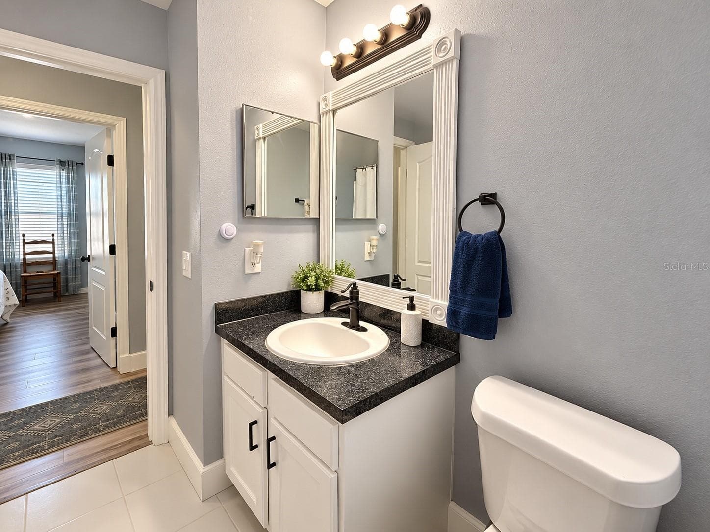 Comfortable secondary bedroom with natural light. - 3998 PEMBERLY PINES CIR, ST CLOUD