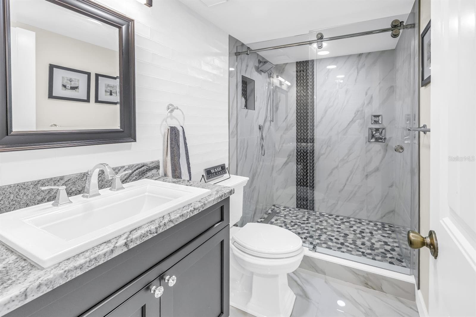 Guest Bath - Spa-Caliber Luxury, Thoughtfully Designed - 15462 GULF BLVD #1006, MADEIRA BEACH