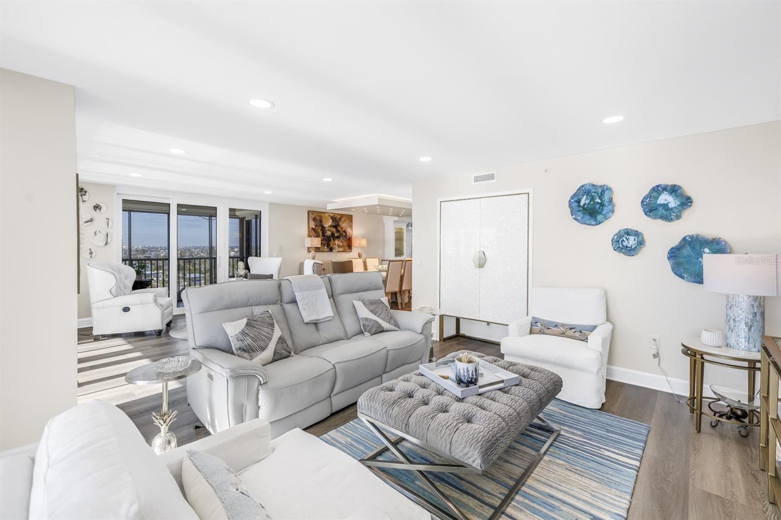 Family Room Features Custom Mother of Pearl Bar Cabinet - 15462 GULF BLVD #1006, MADEIRA BEACH