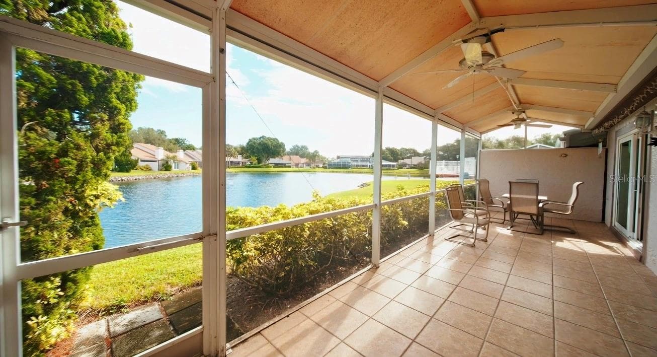 Lakefront views from inside lanai - 4621 HIDDEN VIEW PL #27, SARASOTA