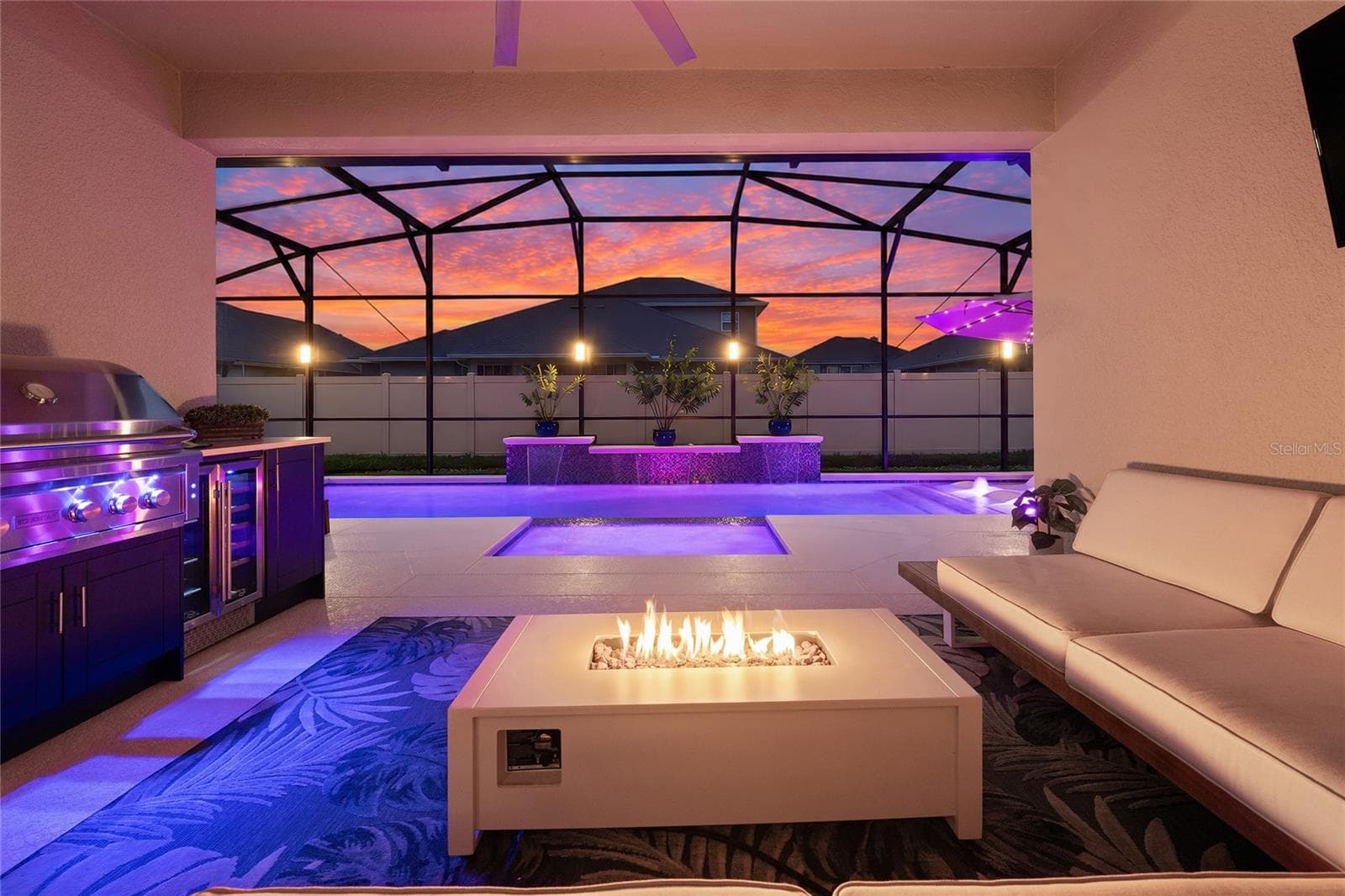 Virtually Enhanced Sunset- Outdoor Kitchen - 489 AVILA PL, HOWEY IN THE HILLS