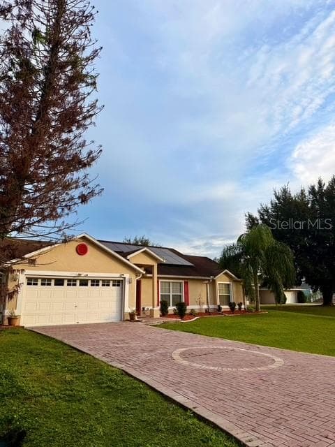 4030 Santa Barbara road, Kissimmee, FL 34746- Front view from the left side of garage - 4030 SANTA BARBARA RD, KISSIMMEE