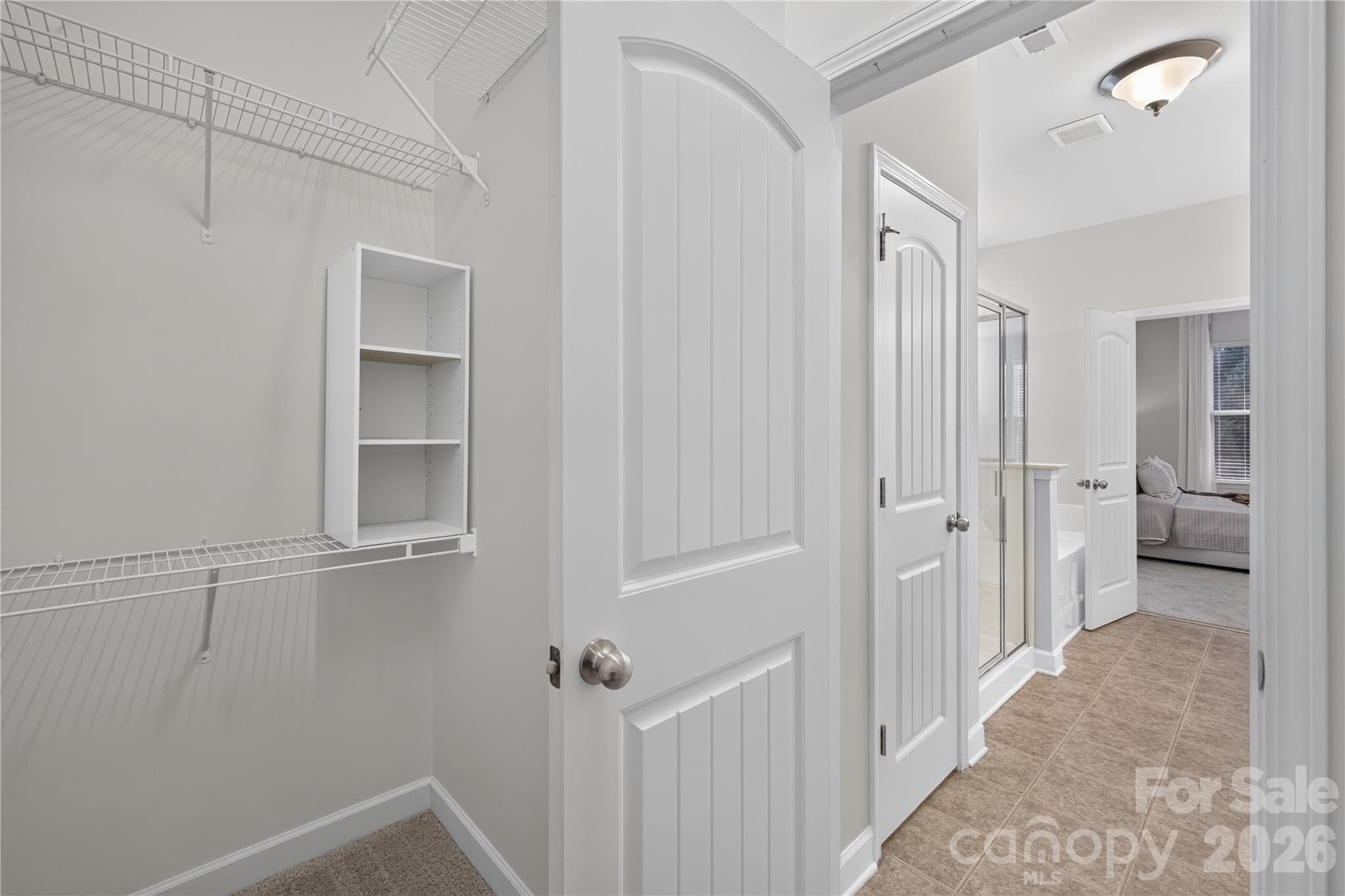 Primary walk-in closet - 17119 Caldwell Track Drive, Huntersville