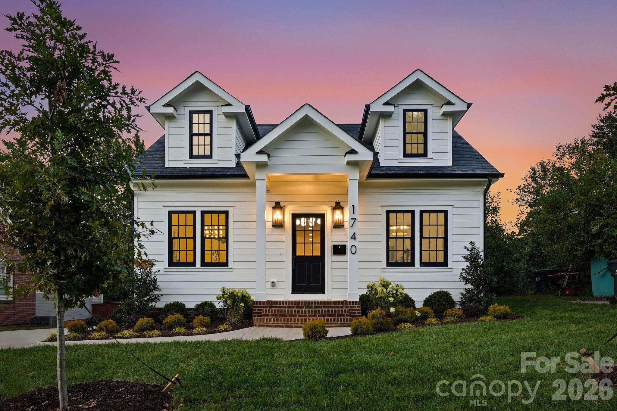 Front exterior at twilight - 1740 Merriman Avenue, Charlotte